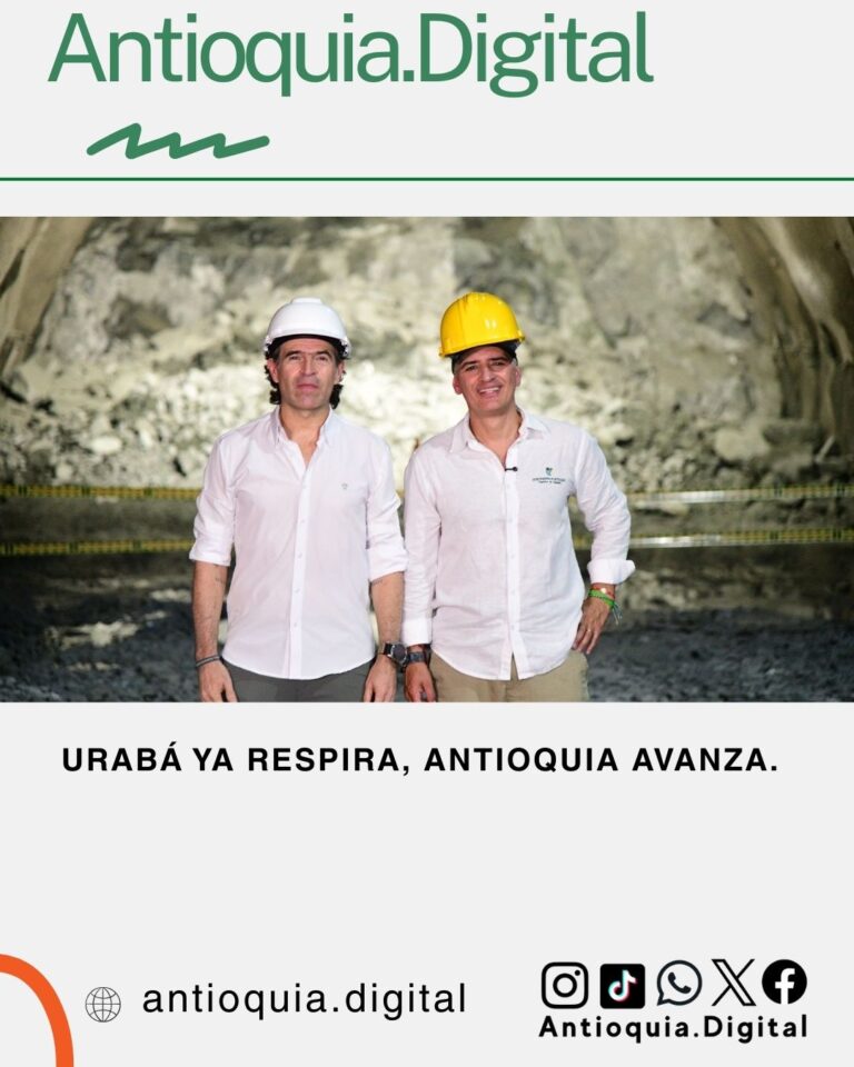 Dos funcionarios con cascos de seguridad dentro del Túnel del Toyo, campaña "Urabá ya respira, Antioquia avanza" de Antioquia Digital.